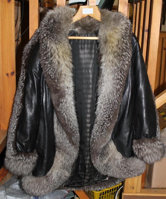 Black leather jacket trimmed with silver fox